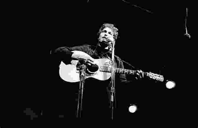 Bob Dylan Performing On Stage. Lennon Dylan Alice And Jesus: The Spiritual Biography Of Rock And Roll